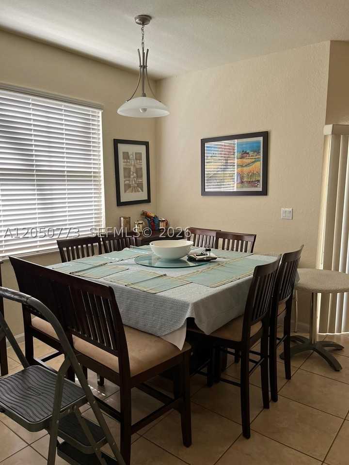 11401 Nw 89th St #104 - Photo 2 of 16