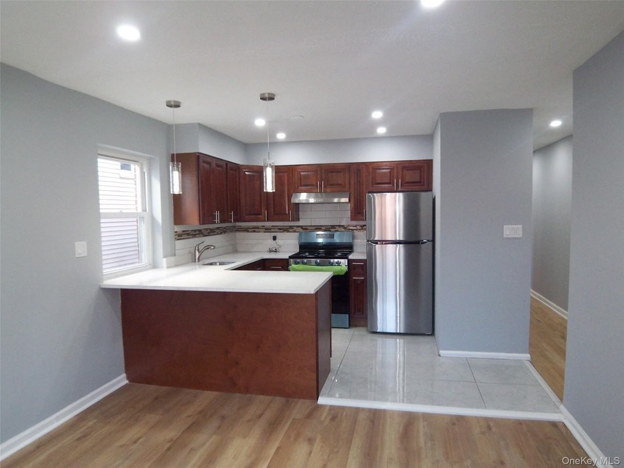 1008 E 228th St #2nd - Photo 2 of 31