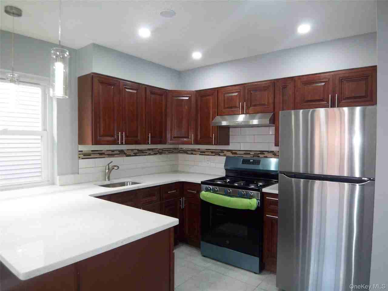 1008 E 228th St #2nd - Photo 3 of 31