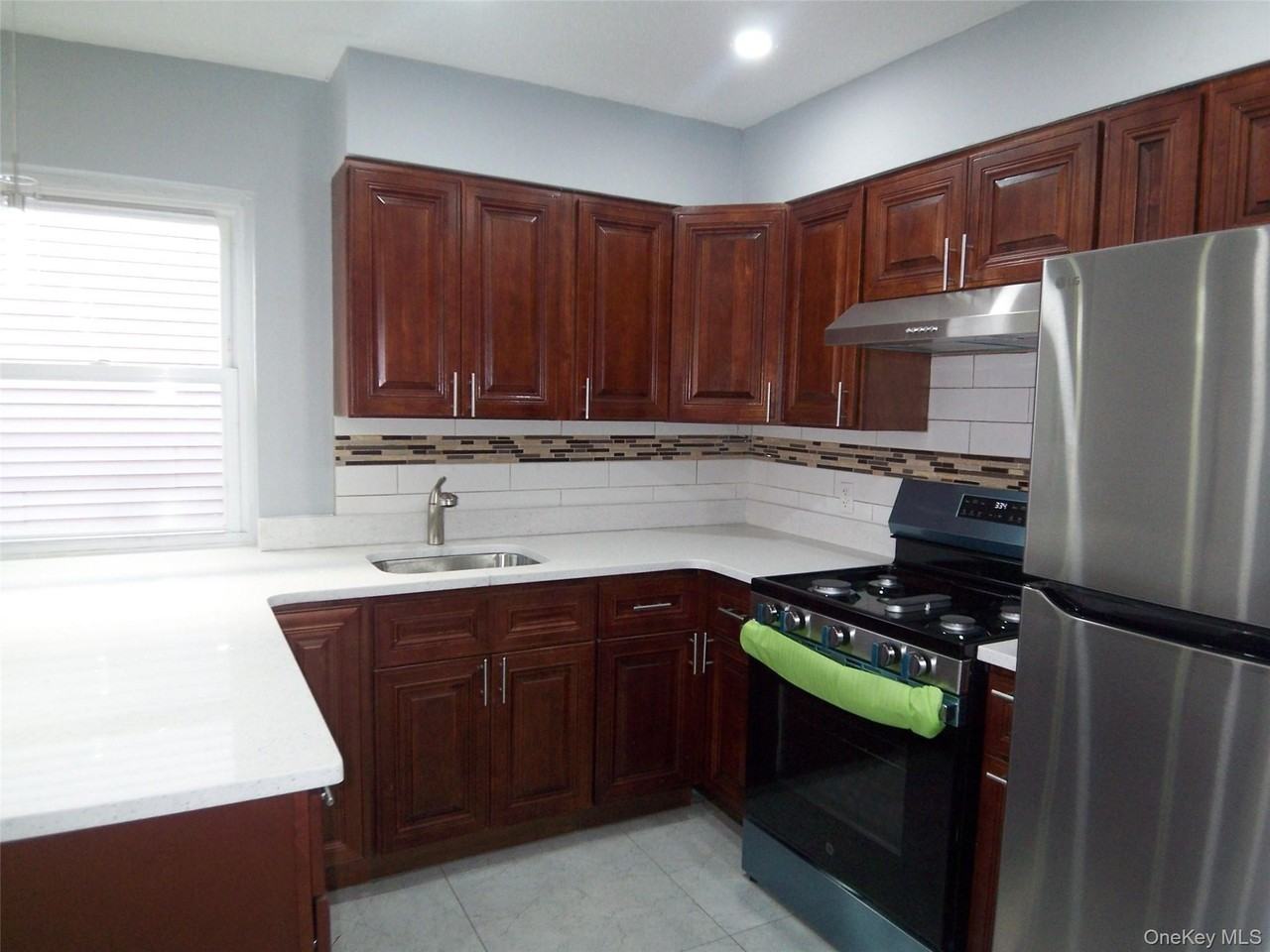 1008 E 228th St #2nd - Photo 4 of 31