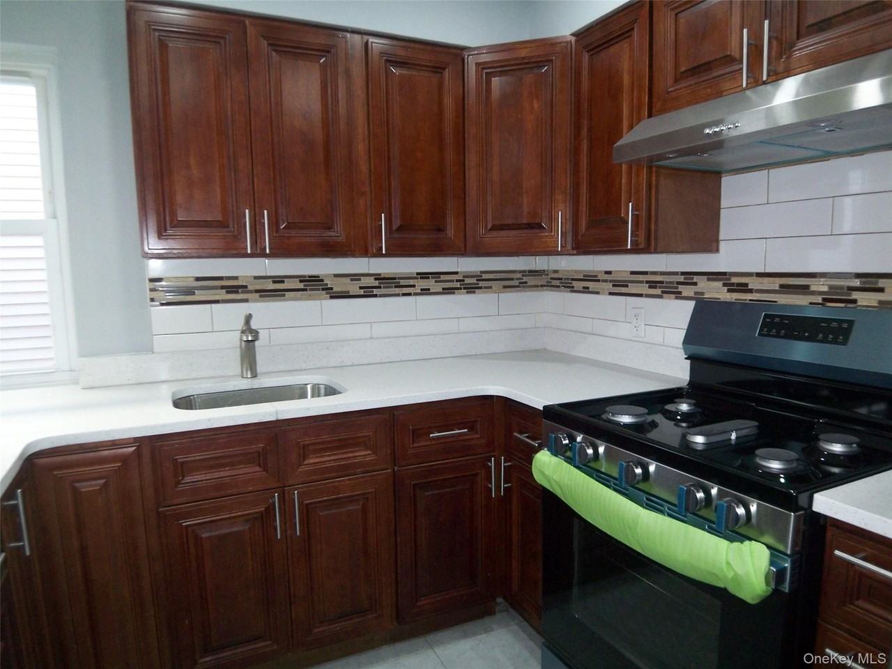 1008 E 228th St #2nd - Photo 6 of 31