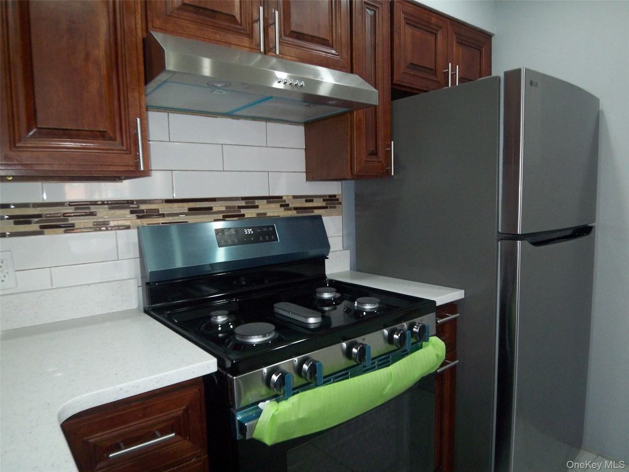 1008 E 228th St #2nd - Photo 7 of 31