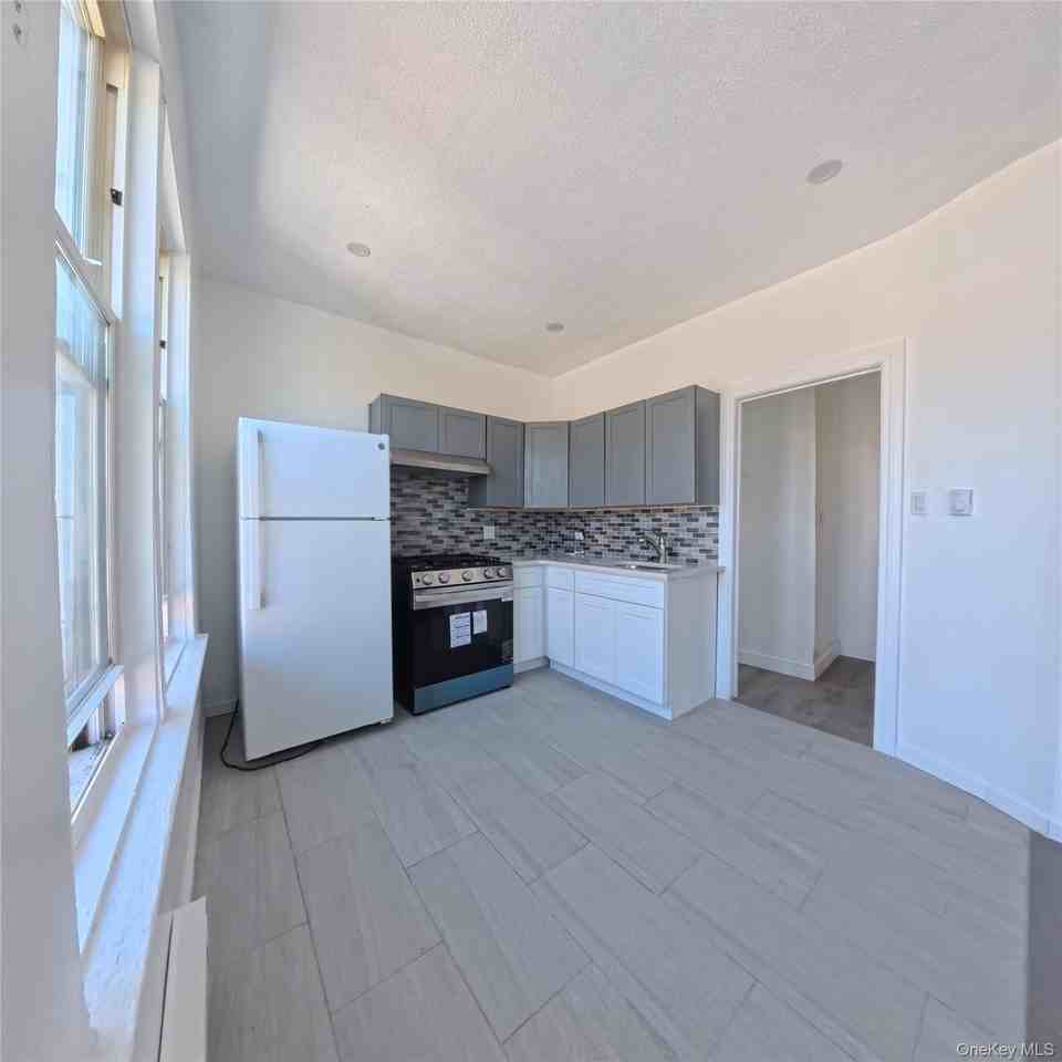 858 E 230th St - Photo 6 of 13