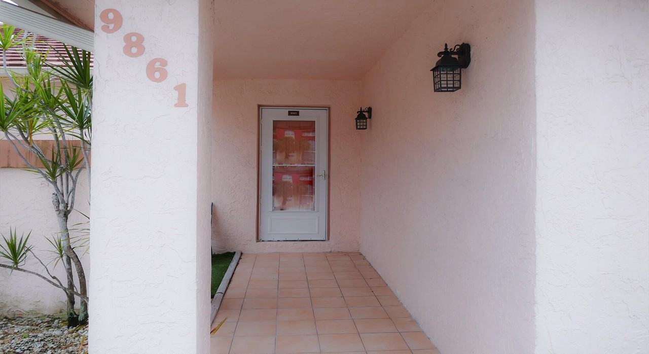 9861 Three Lakes Cir - Photo 2 of 21
