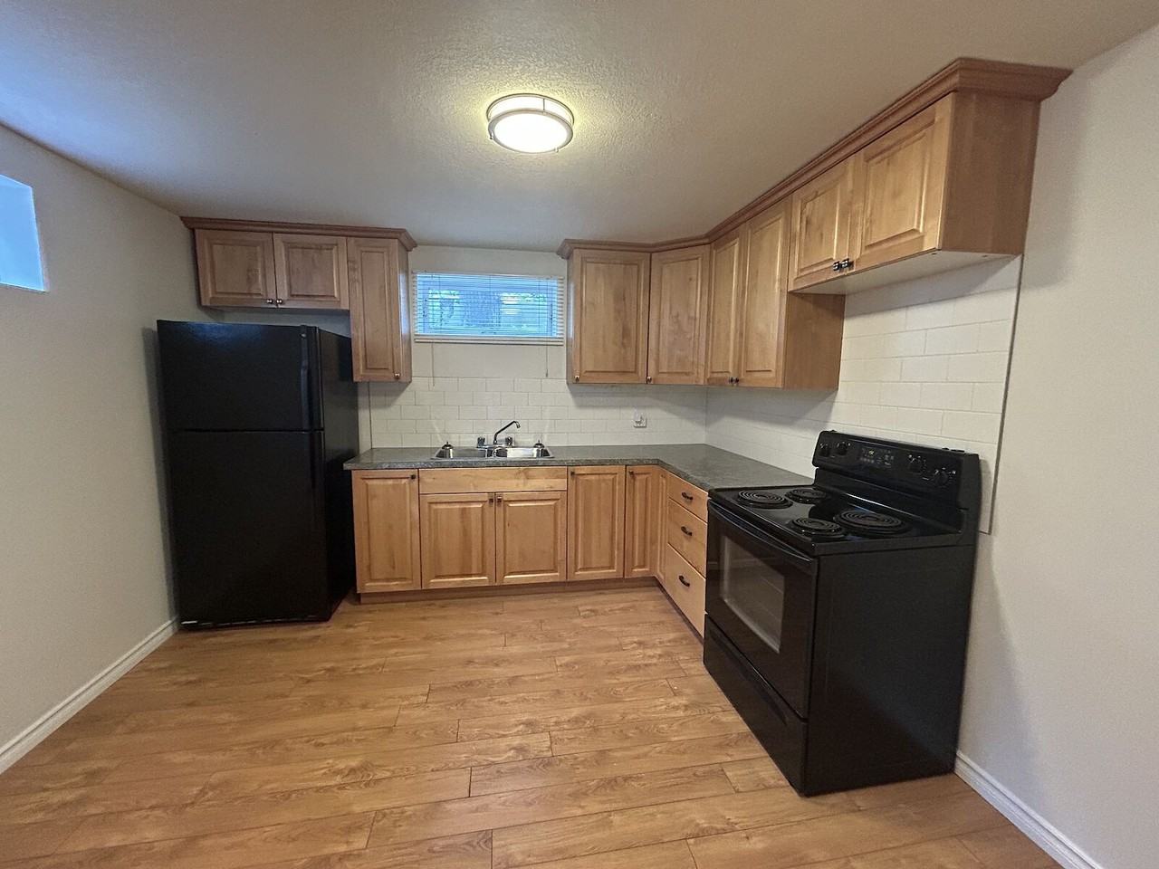 115 44 Ave Nw - Photo 3 of 8