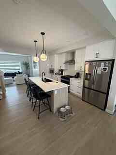 48 Buffaloberry Manor Se - Photo 3 of 21