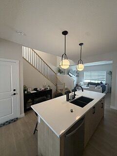 48 Buffaloberry Manor Se - Photo 4 of 21