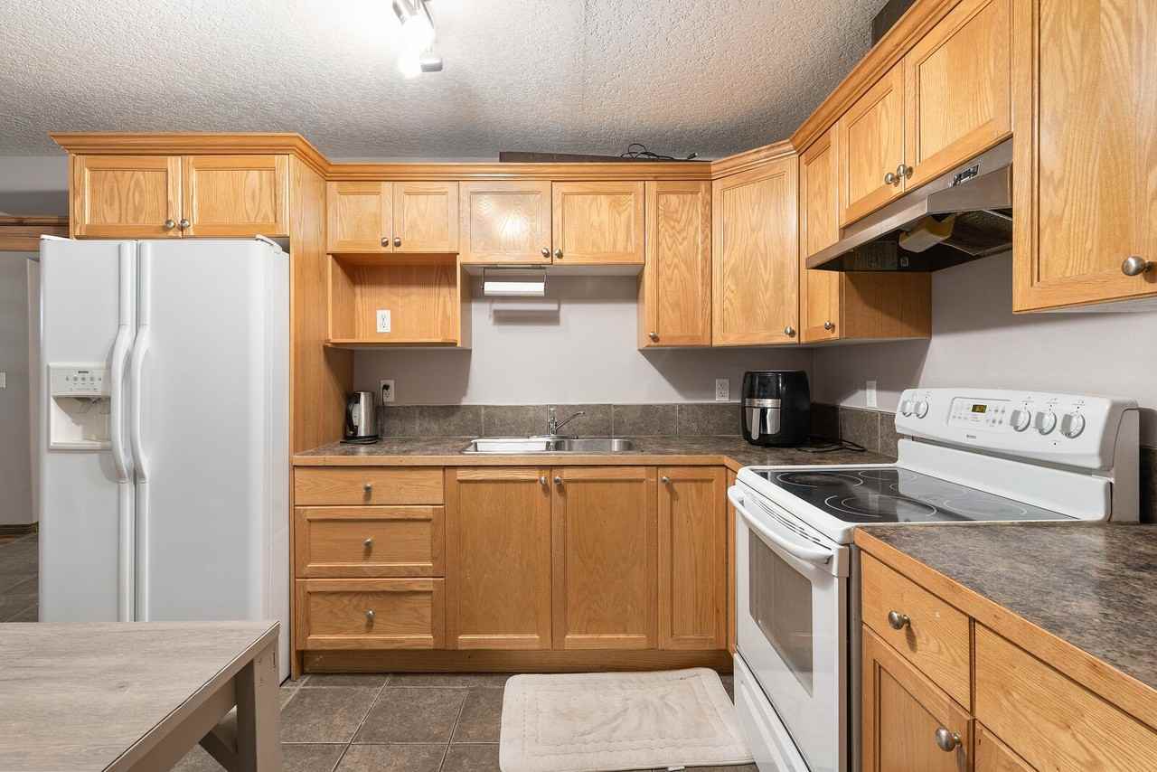 42 Saddleland Cres Ne - Photo 7 of 12