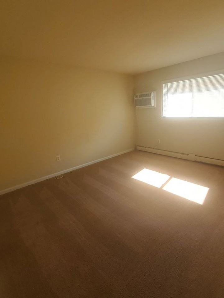 HOLLY GARDEN APARTMENTS - Photo 7 of 14