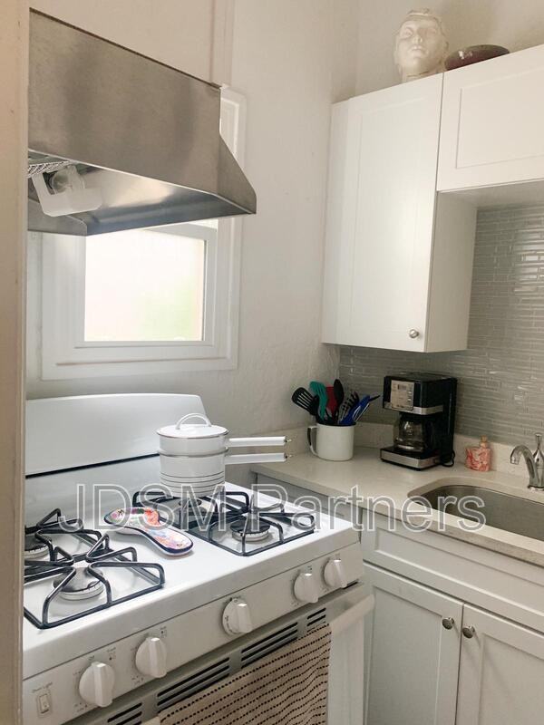1263 N Clarkson St - Photo 3 of 16
