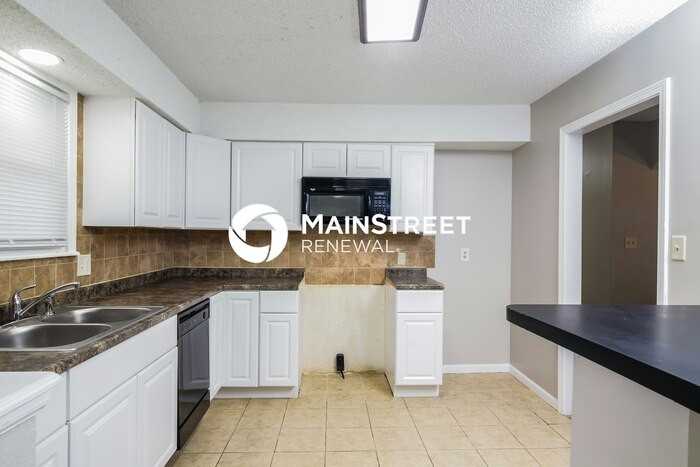 11419 E 58th Ter - Photo 5 of 17