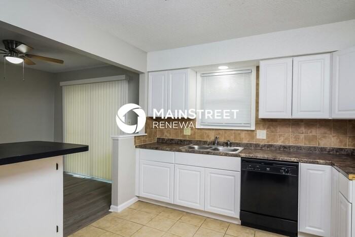 11419 E 58th Ter - Photo 6 of 17