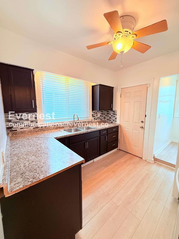 5236 S Clarendon St - Photo 3 of 31