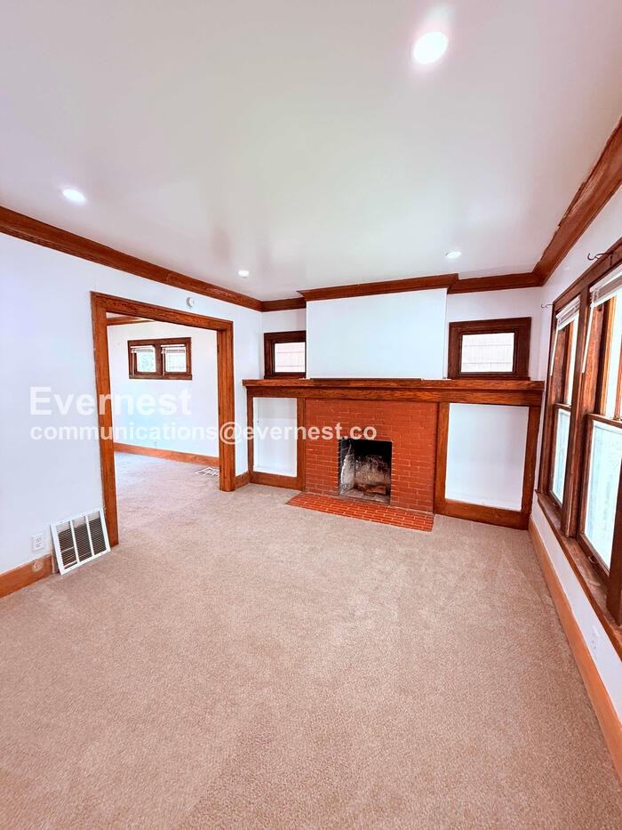 5236 S Clarendon St - Photo 6 of 31