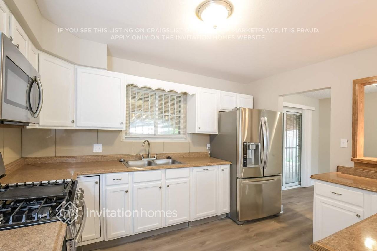13030 E 47th Avenue Cir - Photo 6 of 16