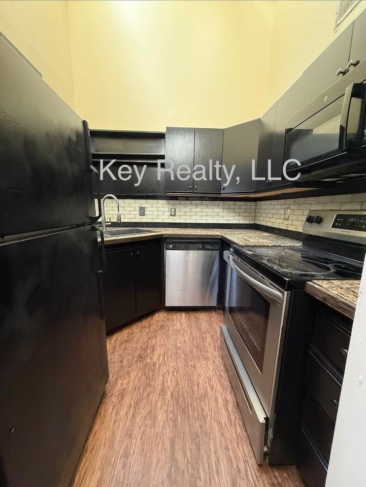 5563 Downing St - Photo 4 of 5