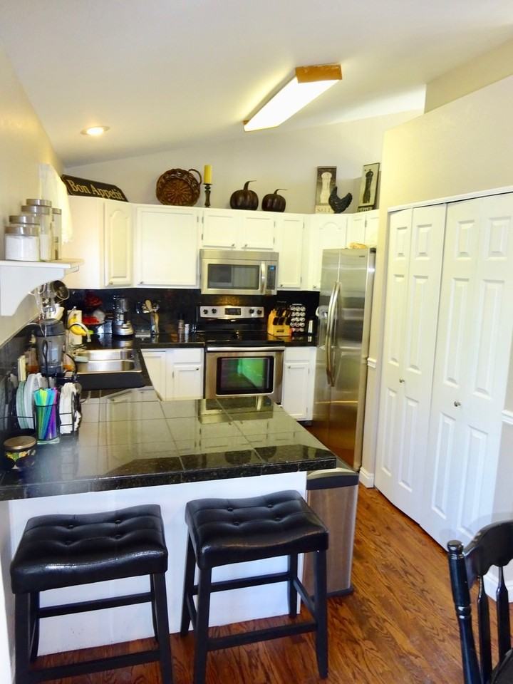 6473 S Tabor Ct - Photo 7 of 25