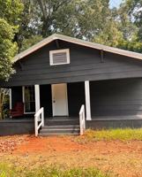 featured image of 209 E 5th St