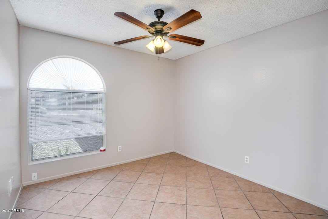 10640 N 66th Ave - Photo 7 of 27
