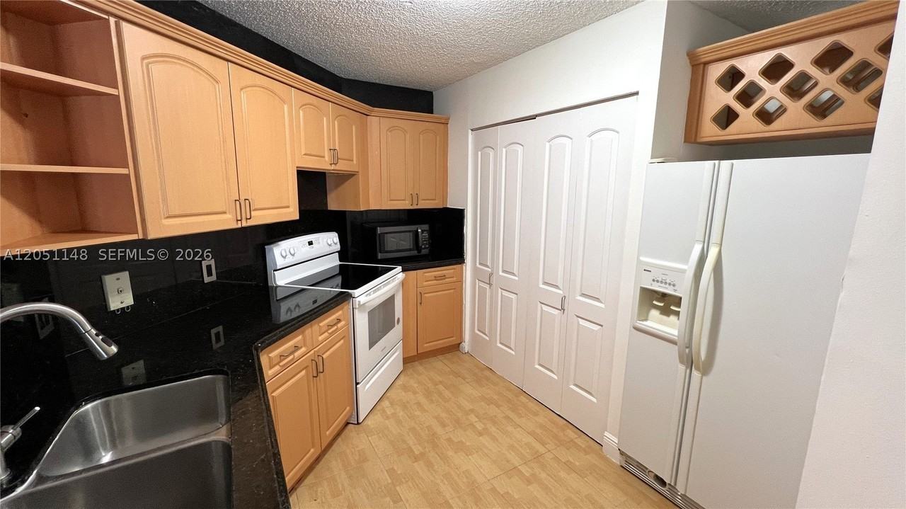 6272 Nw 186th St #104 - Photo 6 of 21