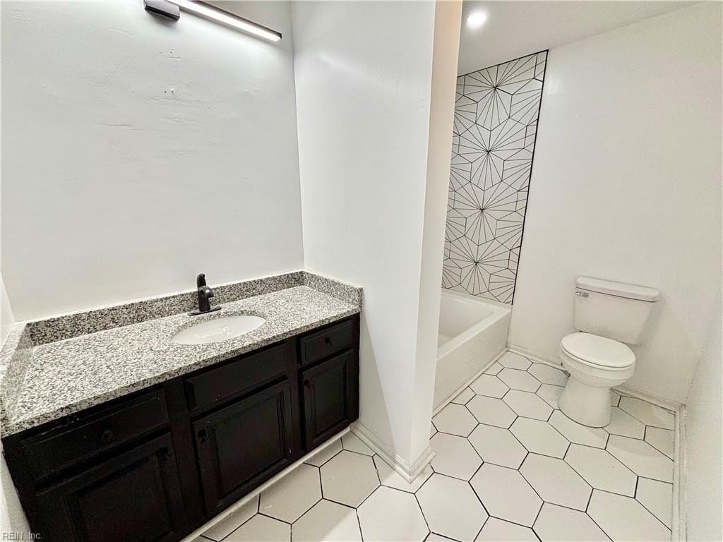1040 W 35th St - Photo 7 of 14