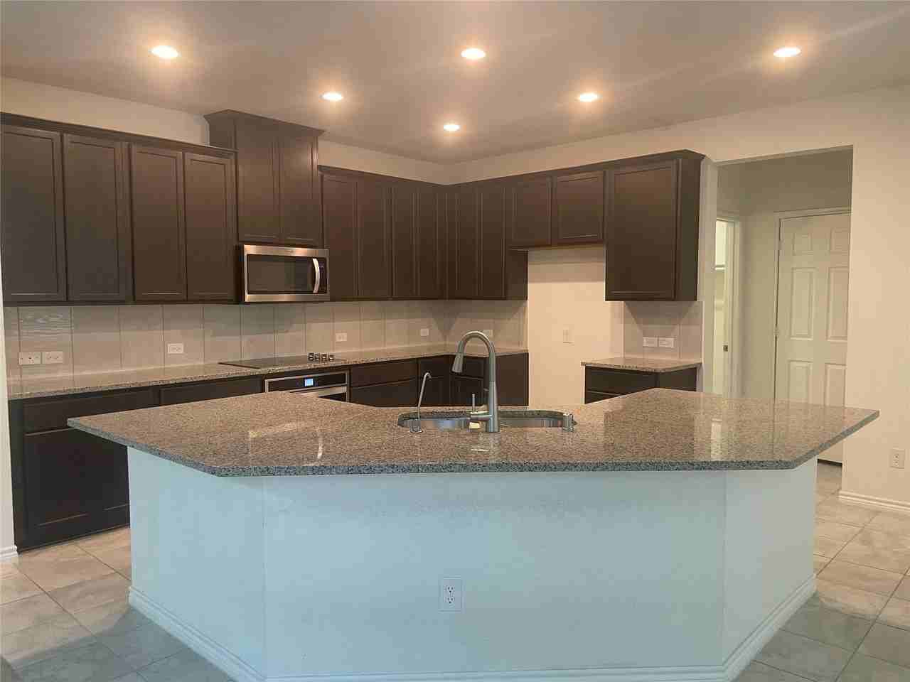 8921 Bison Creek Dr - Photo 3 of 27