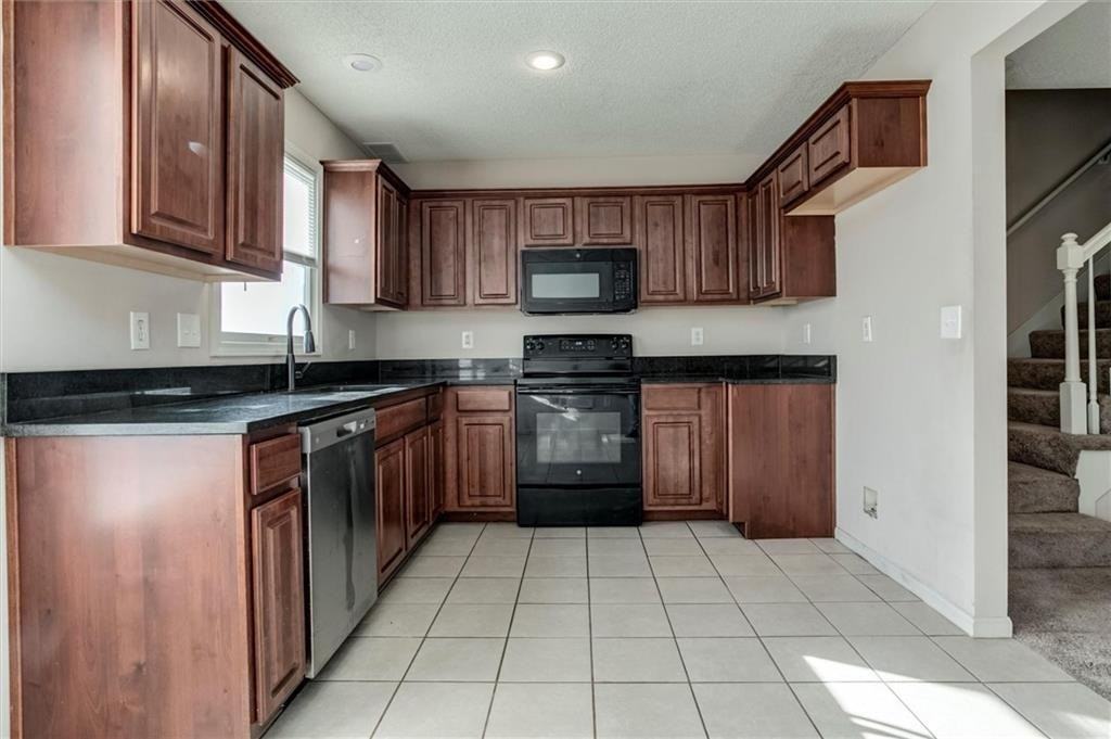 813 E 167th Ct - Photo 5 of 20