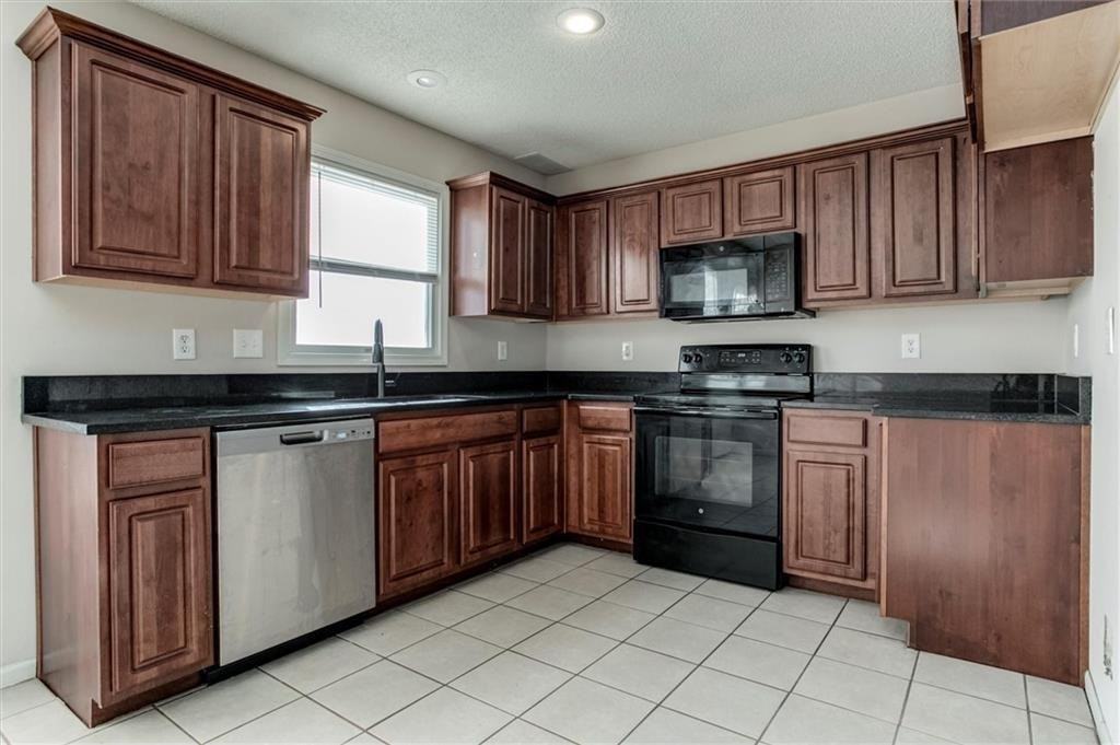 813 E 167th Ct - Photo 7 of 20