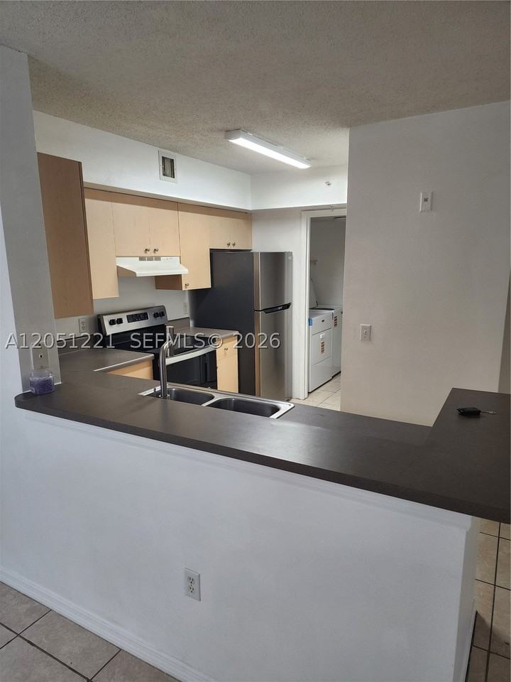 2433 Centergate Dr #203 - Photo 6 of 17