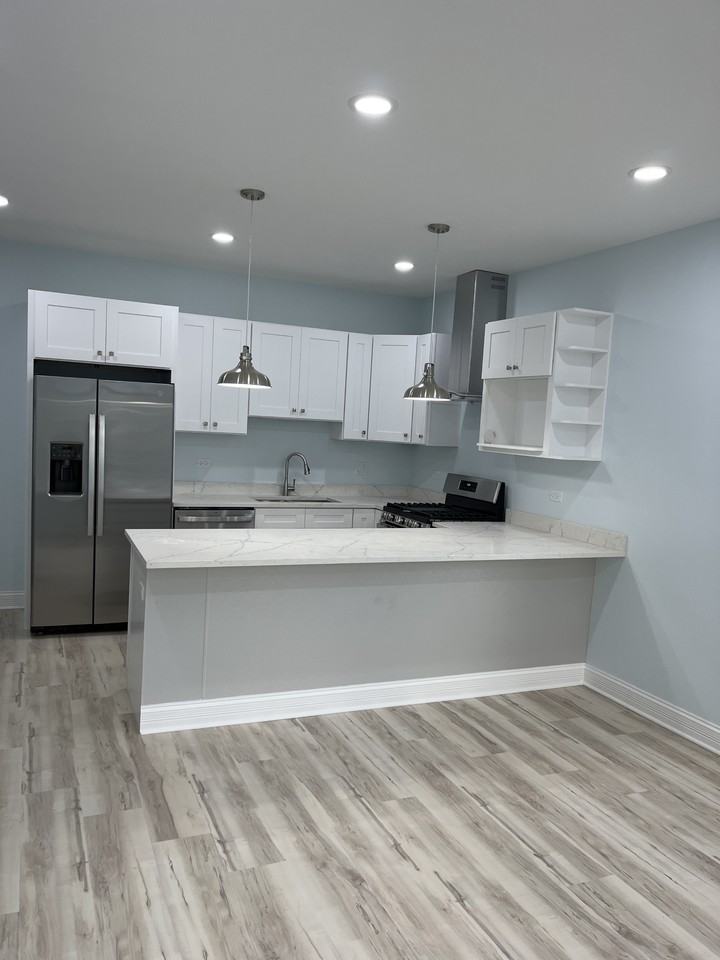 703 N Homan Ave #1 - Photo 3 of 16