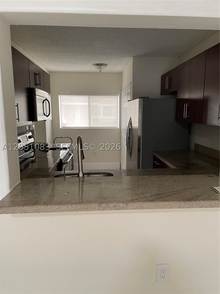 9441 Palm Cir N #0 - Photo 4 of 20