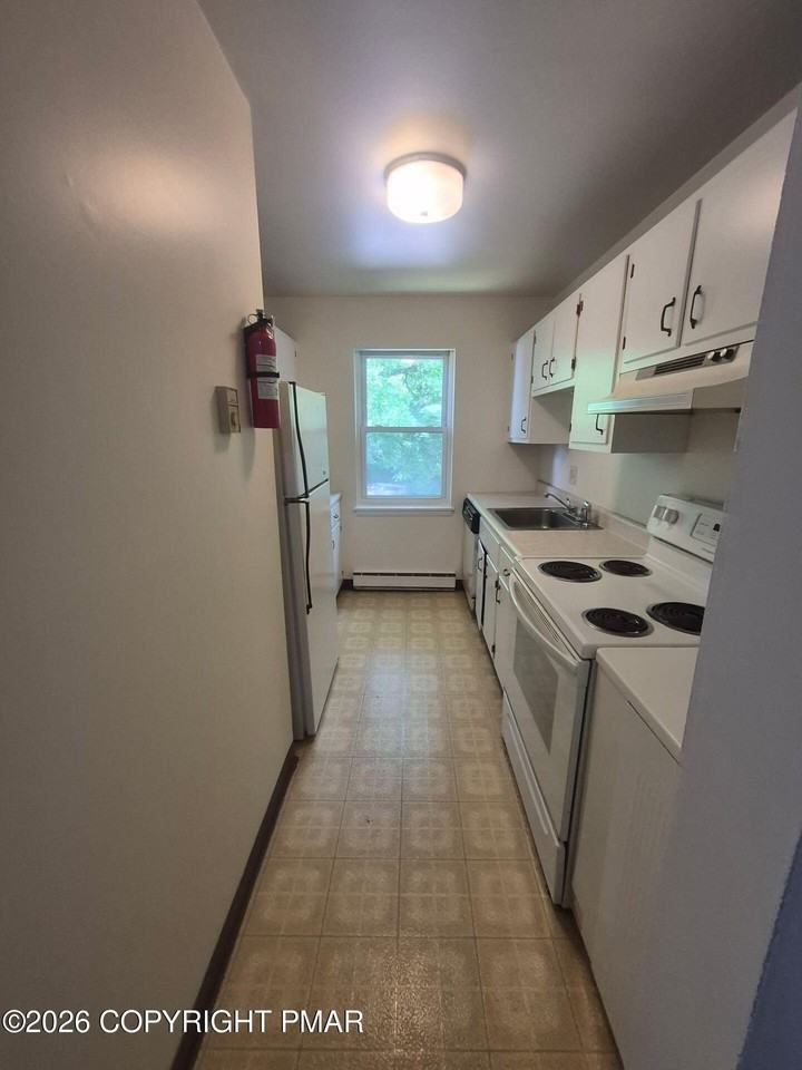 404 Woodcliffe Ave #1-202 - Photo 4 of 8