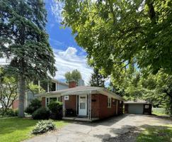 featured image of 1000 Woodlawn Ave