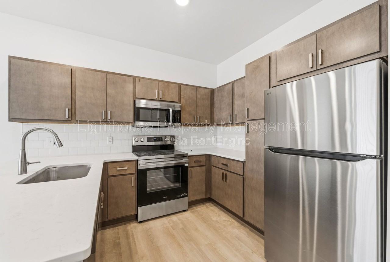 4957 Plainfield Ave Ne #101 - Photo 4 of 40
