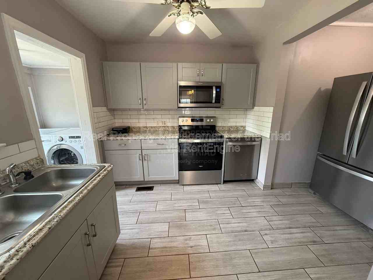 1003 W Wendover Ave - Photo 4 of 14