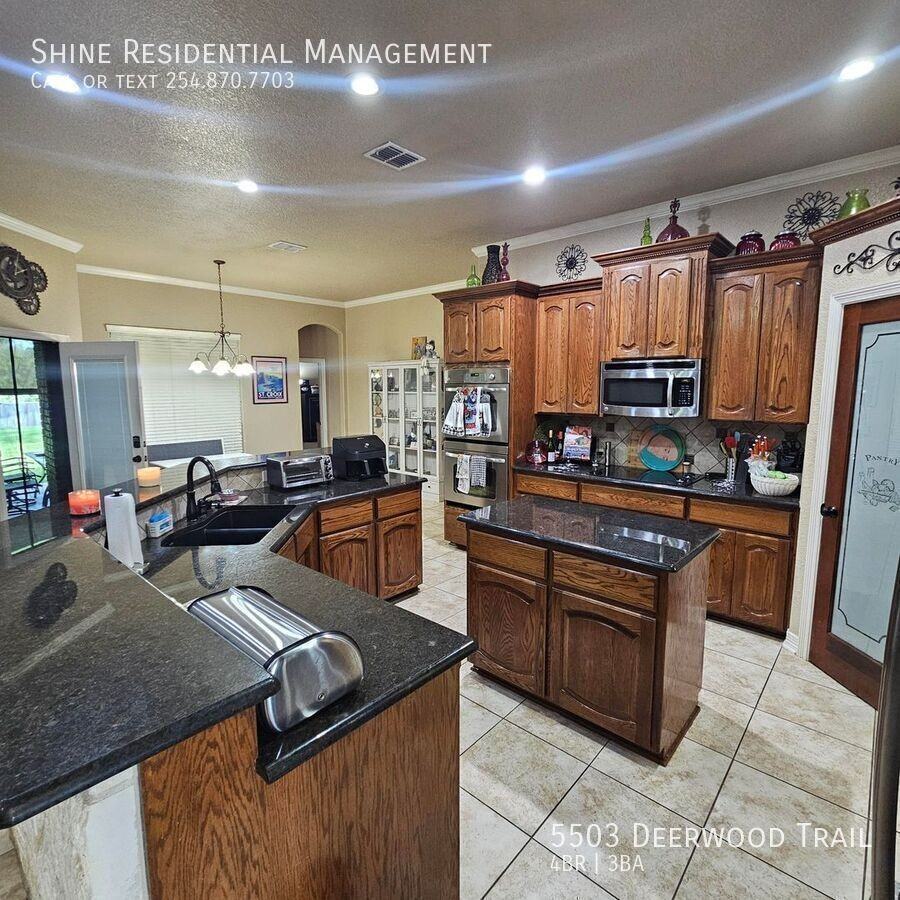 5503 Deerwood Trl - Photo 7 of 23