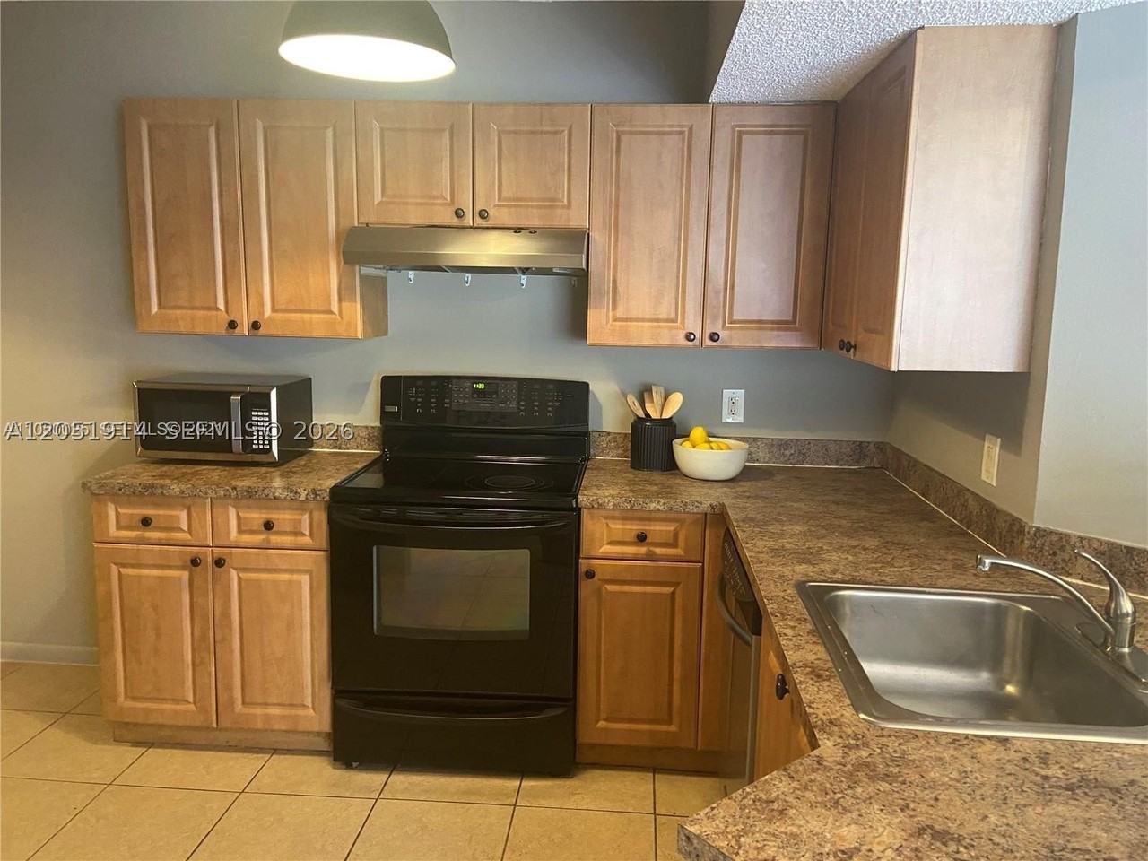 8871 Wiles Rd #301 - Photo 4 of 12