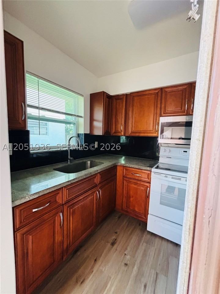 6631 Sw 18th St #103 - Photo 2 of 16