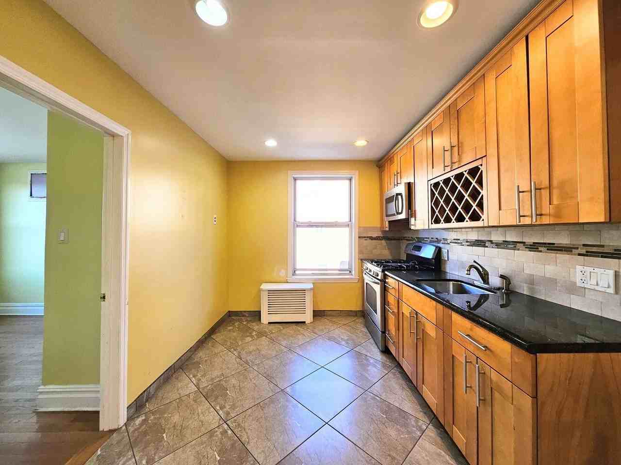 1262 64th St #2R - Photo 3 of 6