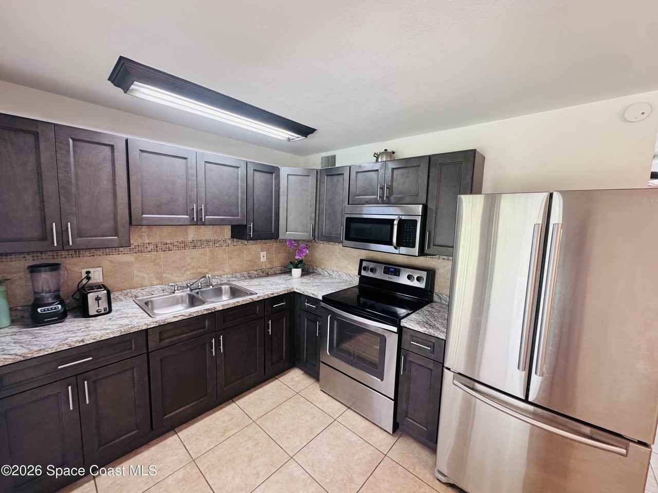 1812 Oakwood Dr - Photo 5 of 12