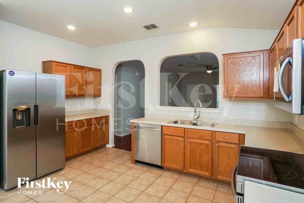 10410 Stallion Bay - Photo 7 of 16