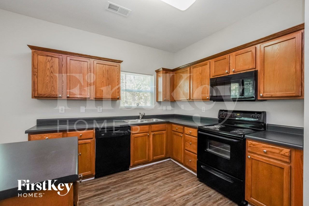 7003 Advocator Ln - Photo 7 of 15