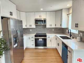 1154 W 67th St - Photo 4 of 8