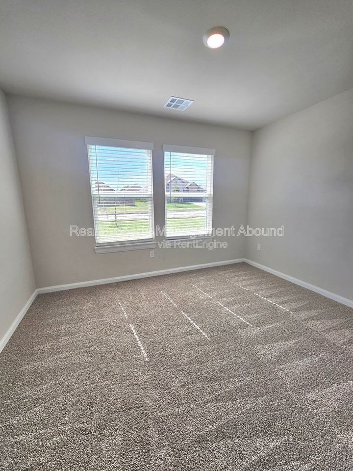 7505 N 155th East Ave - Photo 4 of 25