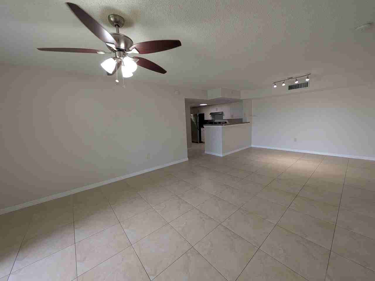 5011 Wiles Rd #208 - Photo 5 of 23