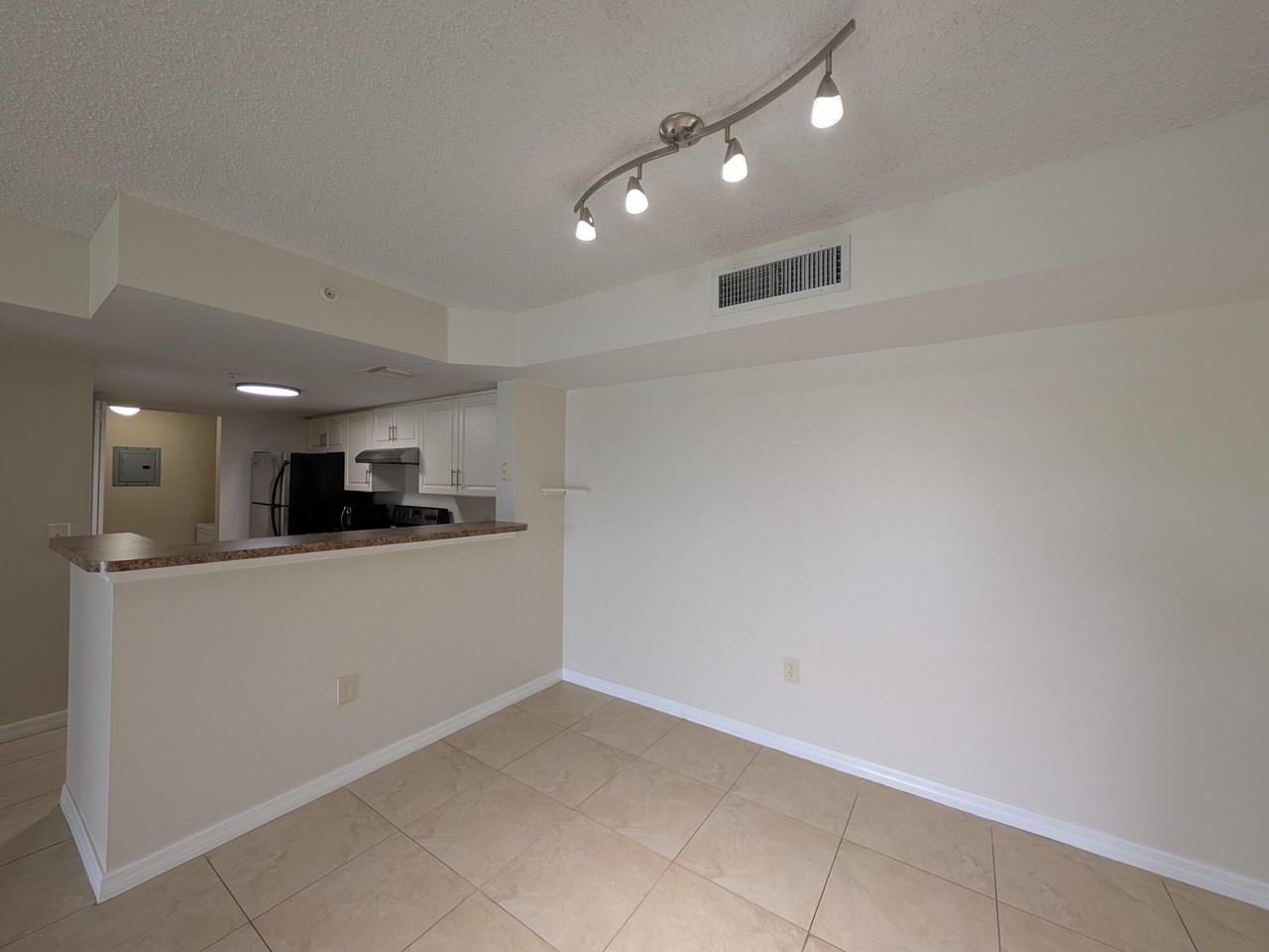 5011 Wiles Rd #208 - Photo 6 of 23