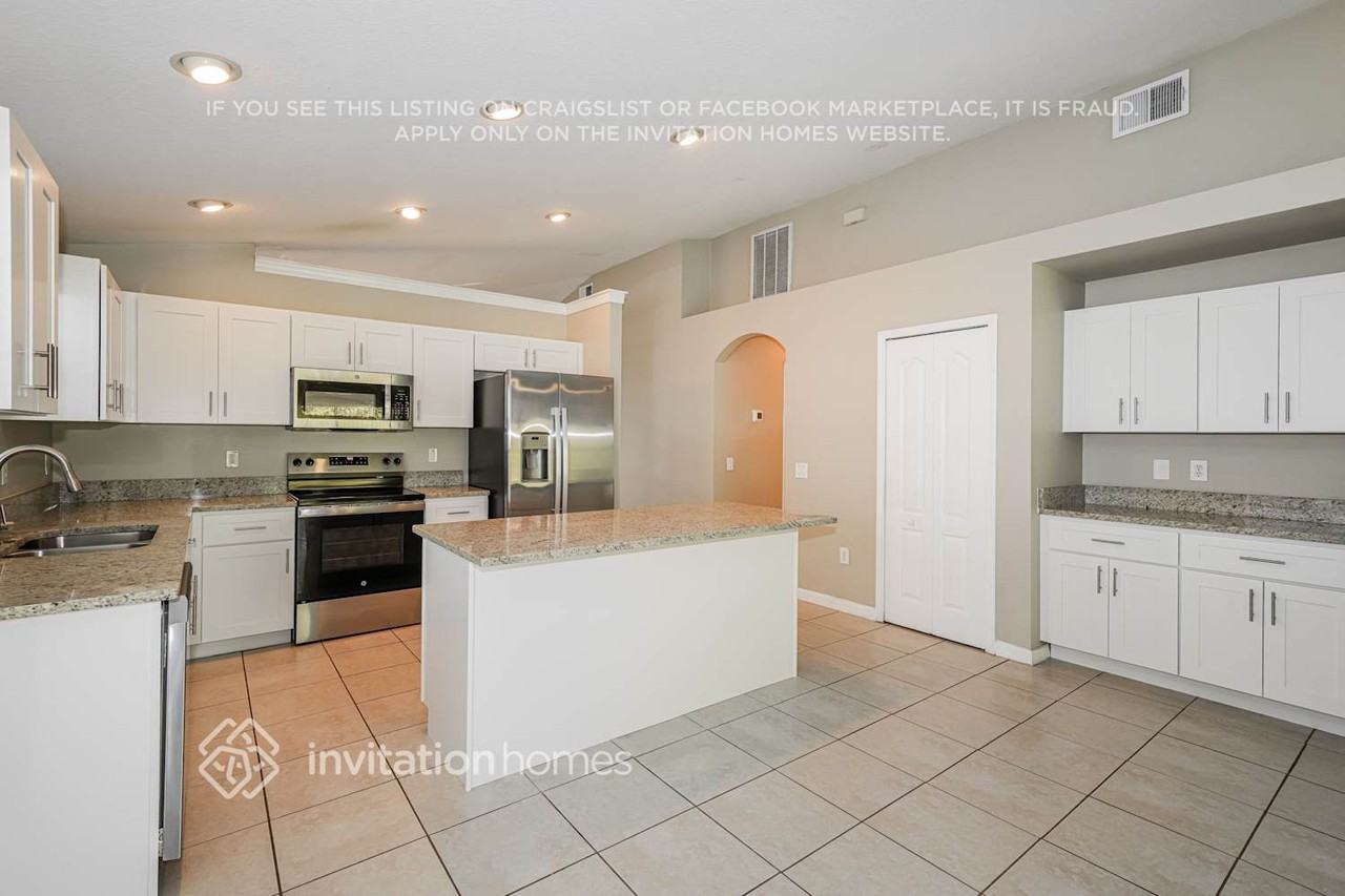 7511 Tower Bridge Dr - Photo 6 of 17