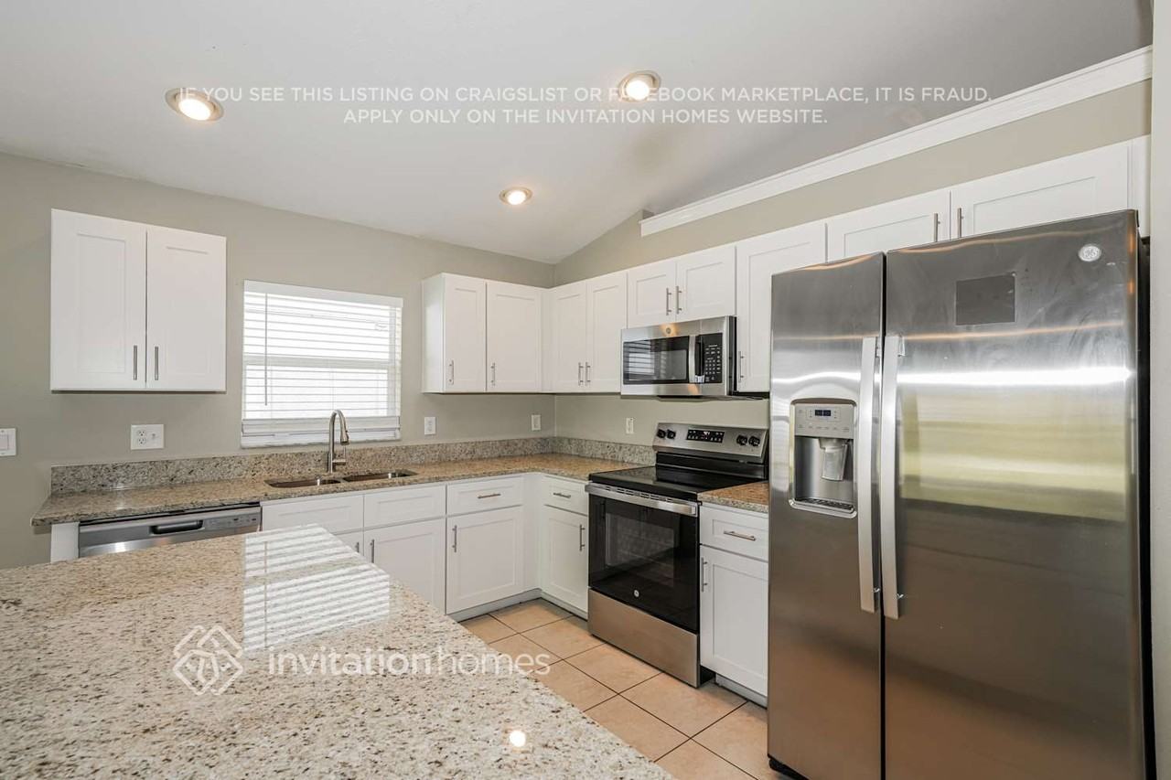 7511 Tower Bridge Dr - Photo 7 of 17