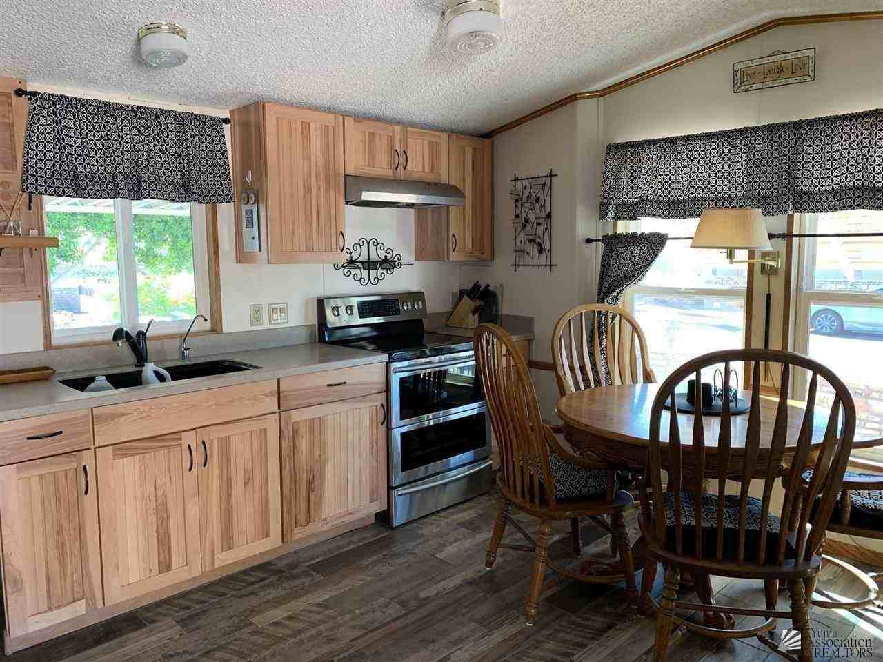 13872 E 47th Dr - Photo 3 of 15