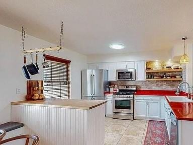 10251 Rempas Dr Nw #1 - Photo 3 of 12
